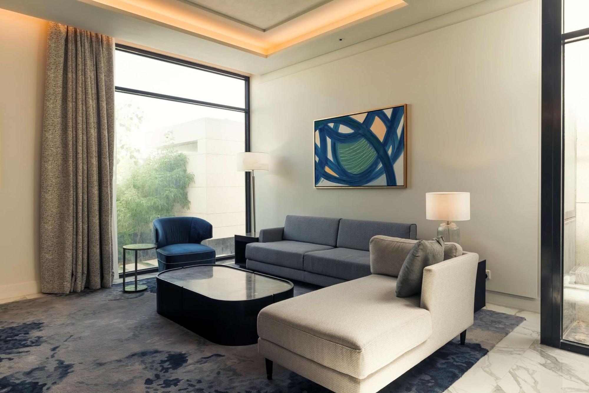 Mansard Riyadh, A Radisson Collection Hotel Экстерьер фото A living room at the hotel