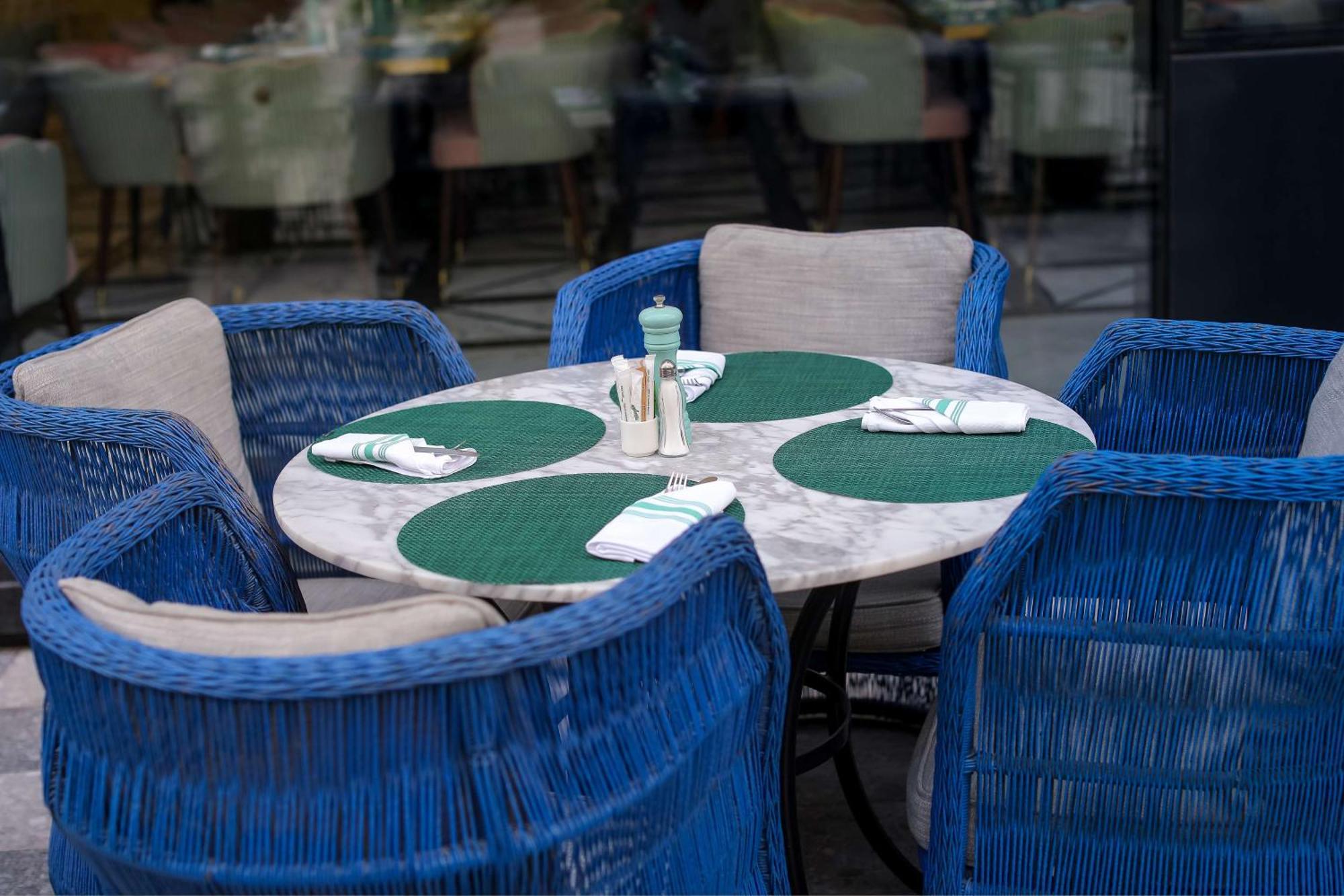 Mansard Riyadh, A Radisson Collection Hotel Экстерьер фото A table with placemats